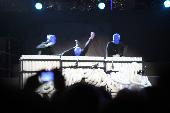The blue man group was performing for free on damrak